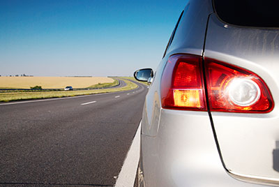image of car abandoned on side of road